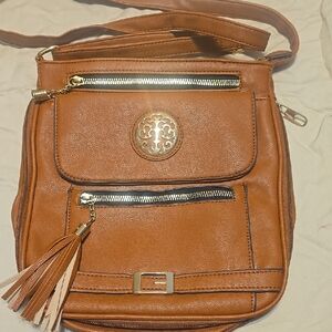Tan Crossbody Bag with Multiple Compartments and Decorative‎ Tassel
